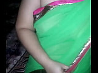 Shonali dressed in unfledged sari